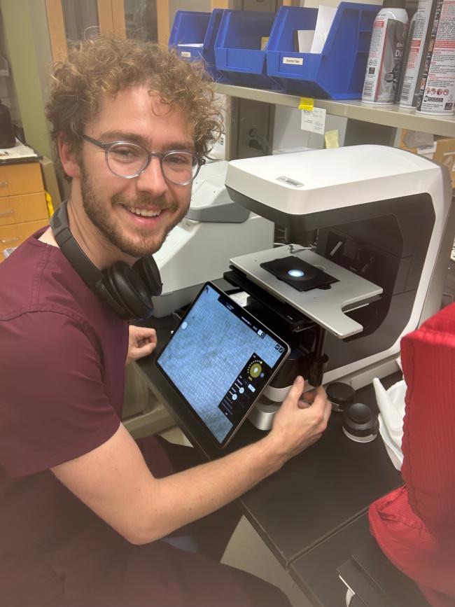 Checking the nylon mesh under a benchtop microscope