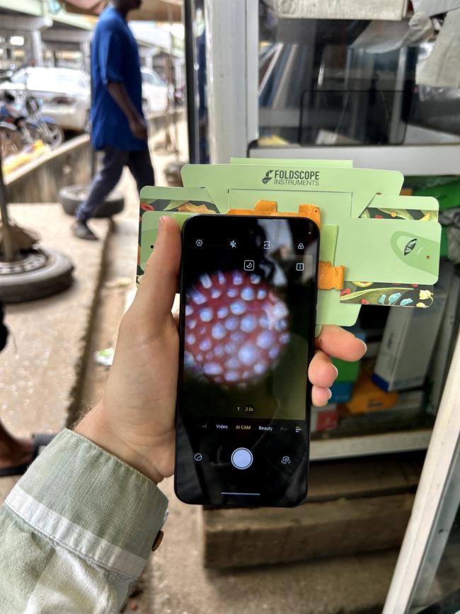 Shopping for used Tecno phones at the market